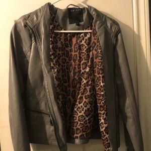 It’s grey with a cheetah inside